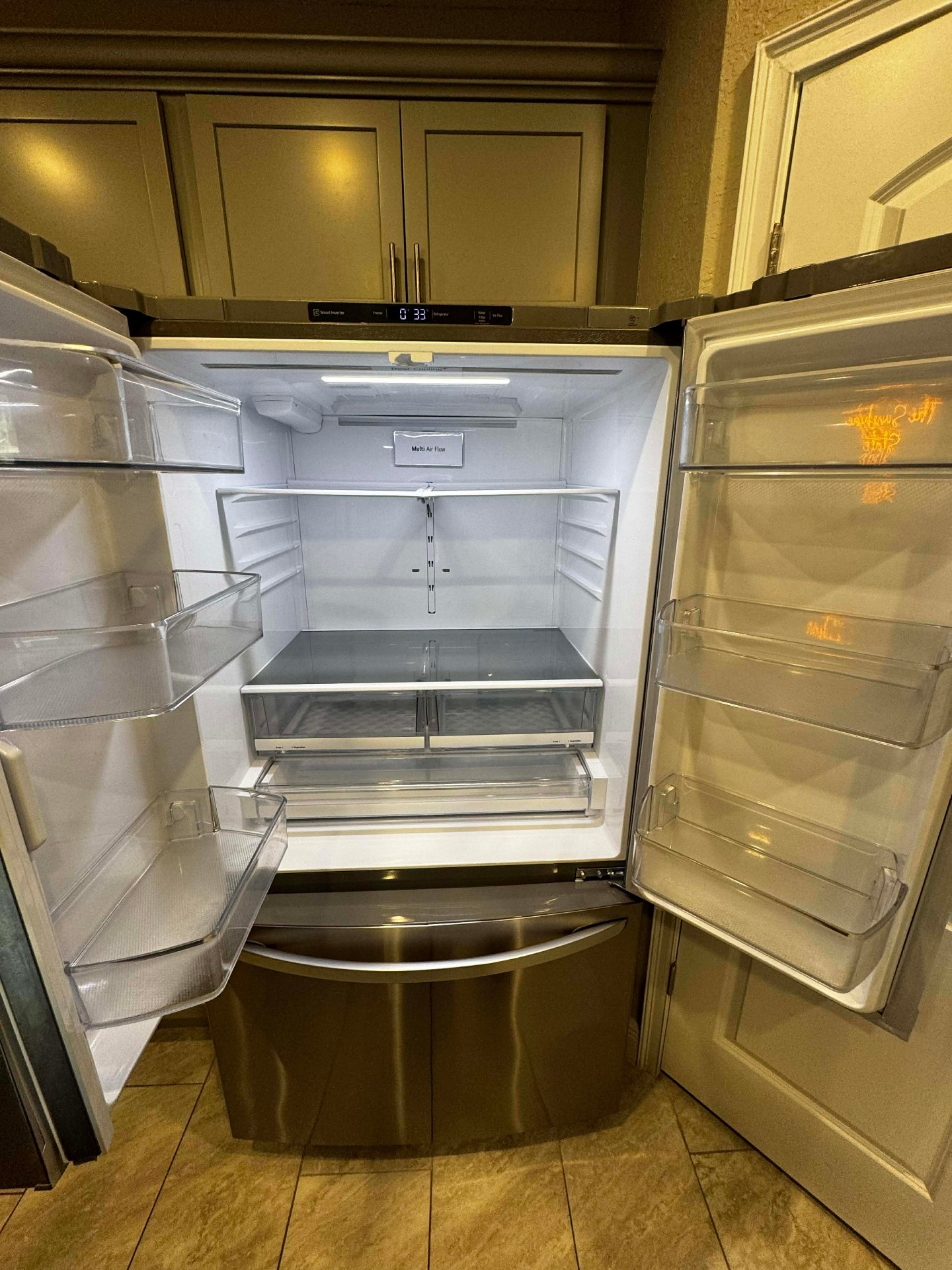 Interior of a French-door refrigerator scrubbed spotless during a MOR Clean deep clean in Daytona Beach
