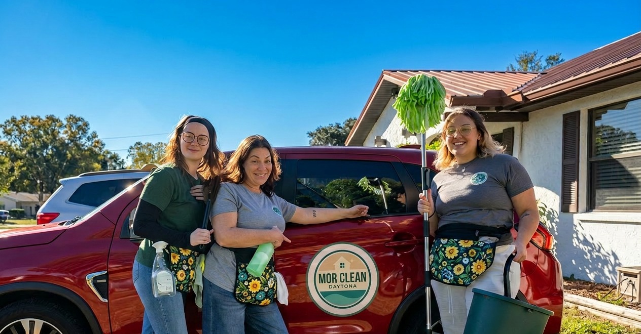 The MOR Clean Daytona mother-and-daughter team beside their service vehicle in Volusia County, Florida